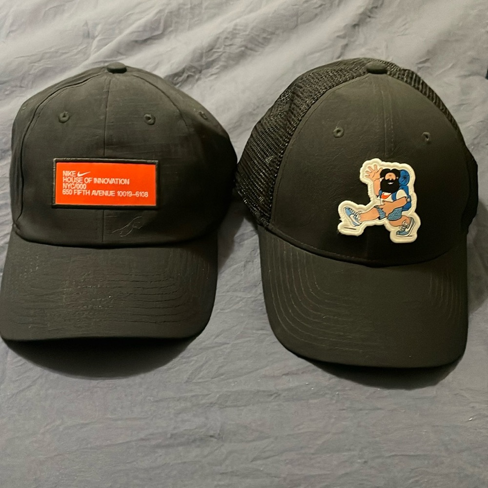 Nike hat bundle. Both hats black, one size adjustable